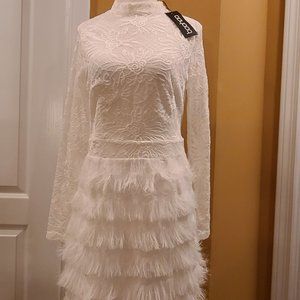 Lace dress with fringes